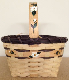 Magnolia basket 9 dia x 9 1/2 include handle  hand painted magnolia on handle and around basket $35