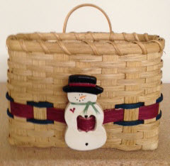 Christmas mail basket 7 1/2 long x 4  1/2 wide x 5 1/4 high Small bushel handles. Great and red accent with ceramic snow man